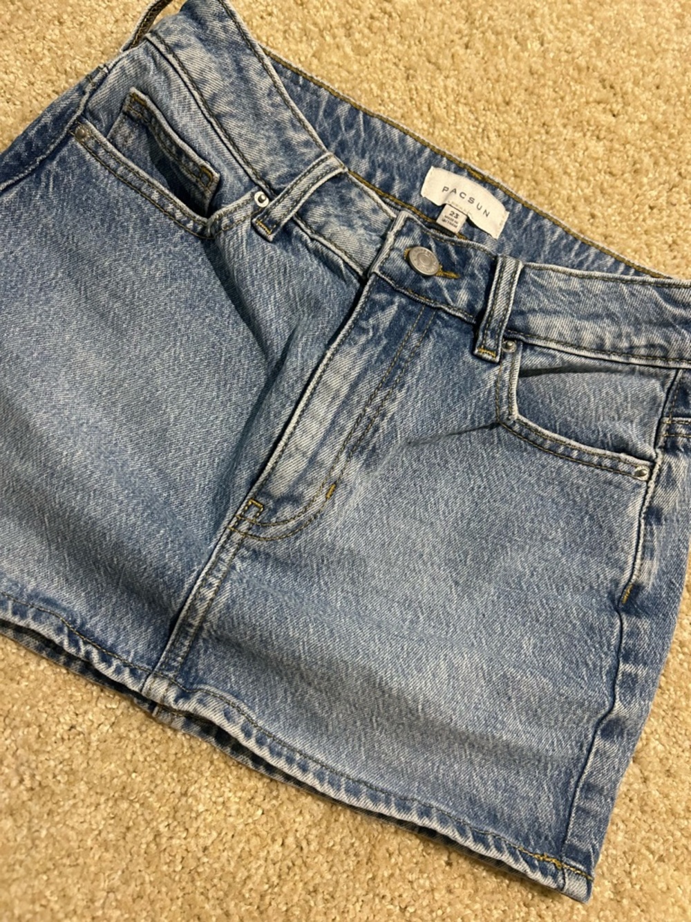 PacSun Medium Wash Blue Denim Mini Skirt with Branded Button